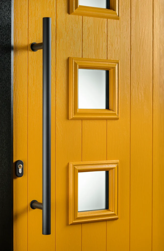 Bold Copper Flame Solidor door with matt black hardware — a standout choice for installers supplying Solidor doors to their customers